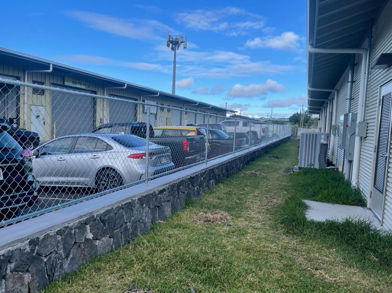 Rock wall with fencing